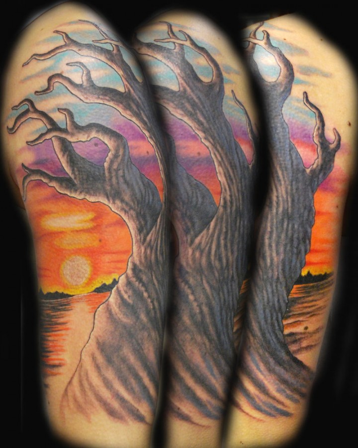 Sunset and tree tattoo