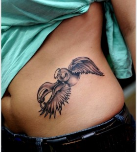 Swallow angel hip tattoo