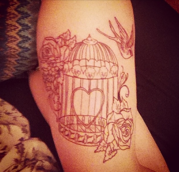 Sweet birdcage leg tattoo
