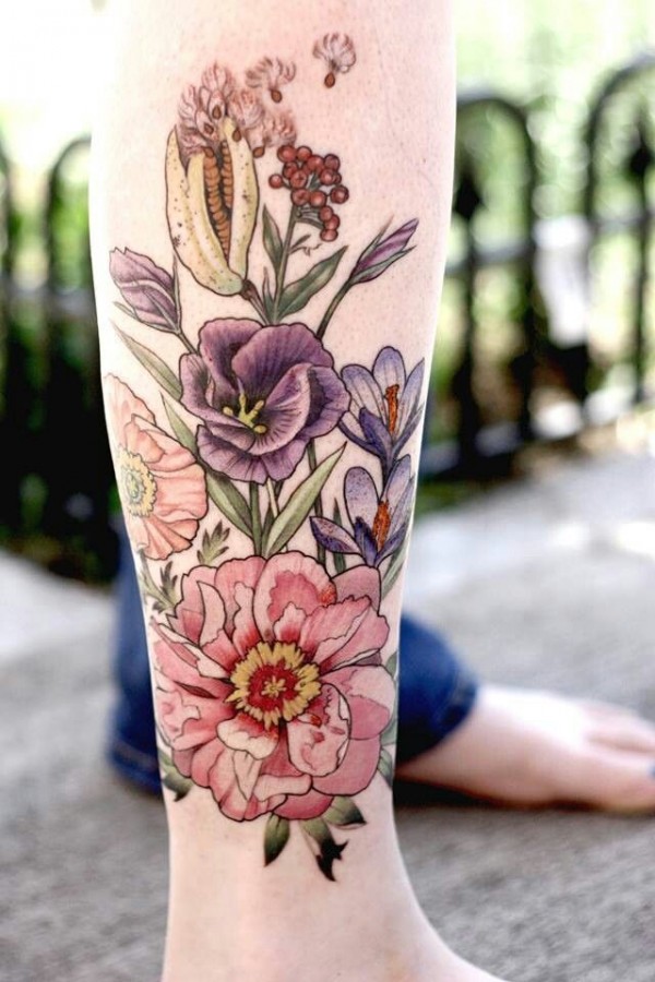 Sweet flowers leg tattoo by Alice Kendall