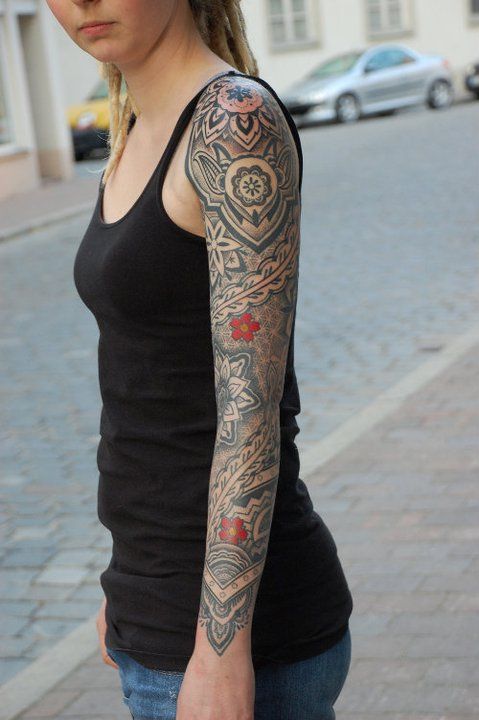 Sweet full arm tattoo by Gerhard Wiesbeck