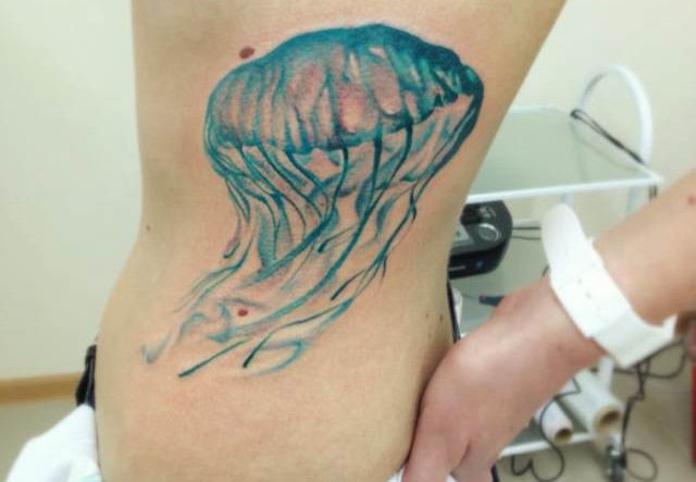 Sweet jellyfish side tattoo