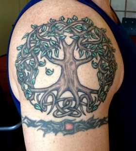 Sweet oak tree arm tattoo