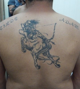 Sweet sagittarius back tattoo