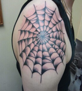 Sweet spider web tattoo