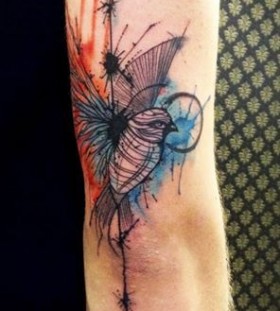 Sweet watercolour bird tattoo by Tyago Compiani