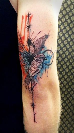 Sweet watercolour bird tattoo by Tyago Compiani