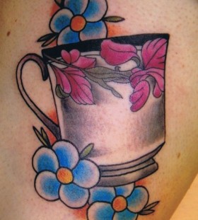 Teacup and flowers tattoo