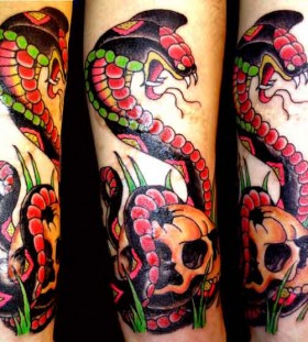 Terrifying cobra arm tattoo