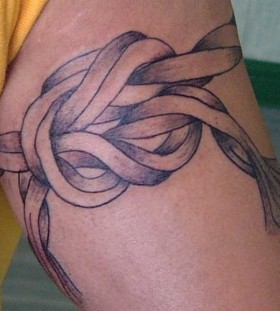 Tied up rope tattoo