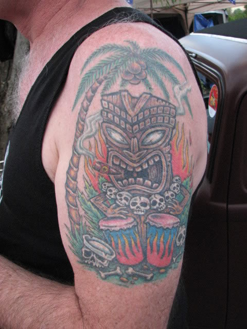Tiki and bongos tattoo