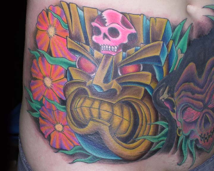 Tiki and skull tattoo