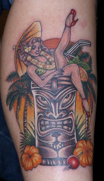 Tiki and woman tattoo