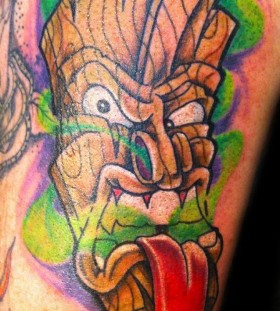 Tiki with tongue tattoo
