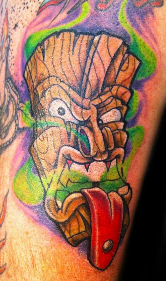 Tiki with tongue tattoo