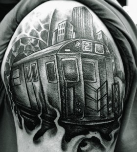 Train and buildings tattoo