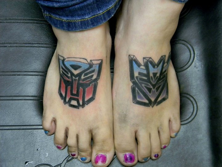 Transformers logo foot tattoos