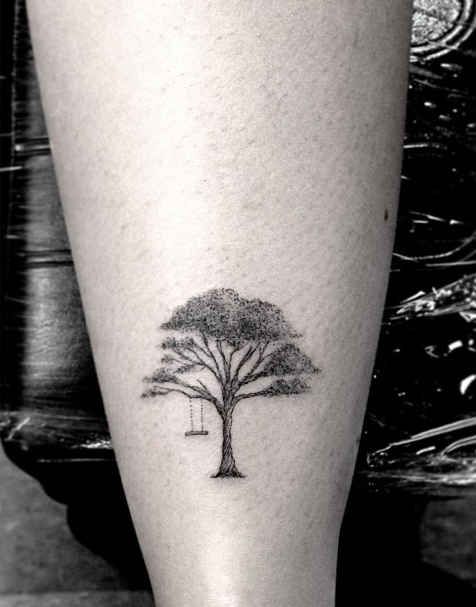 Tree and swing tattoo by Dr Woo