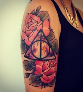 Triangle and flowers tattoo by Alex Dorfler