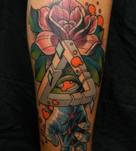 Triangle eye and flower tattoo