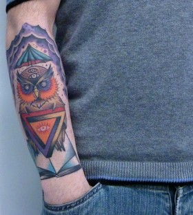 Triangle eye and owl tattoo