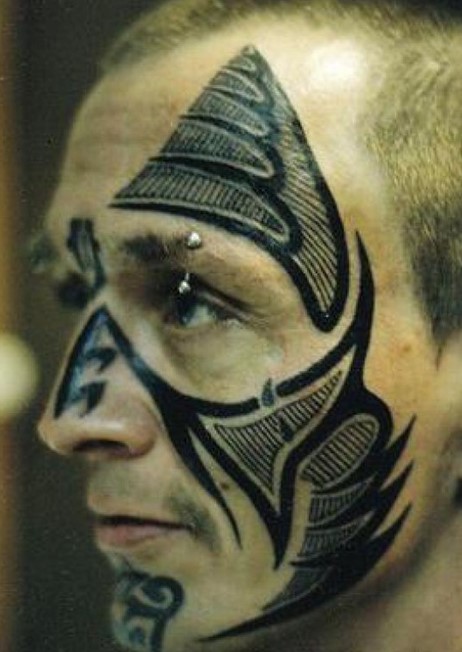 Tribal face tattoo