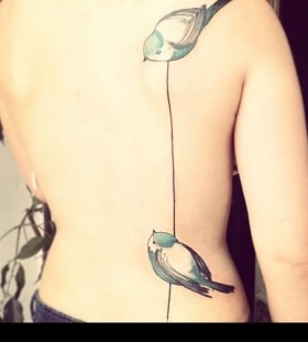 Two chickadees back tattoo