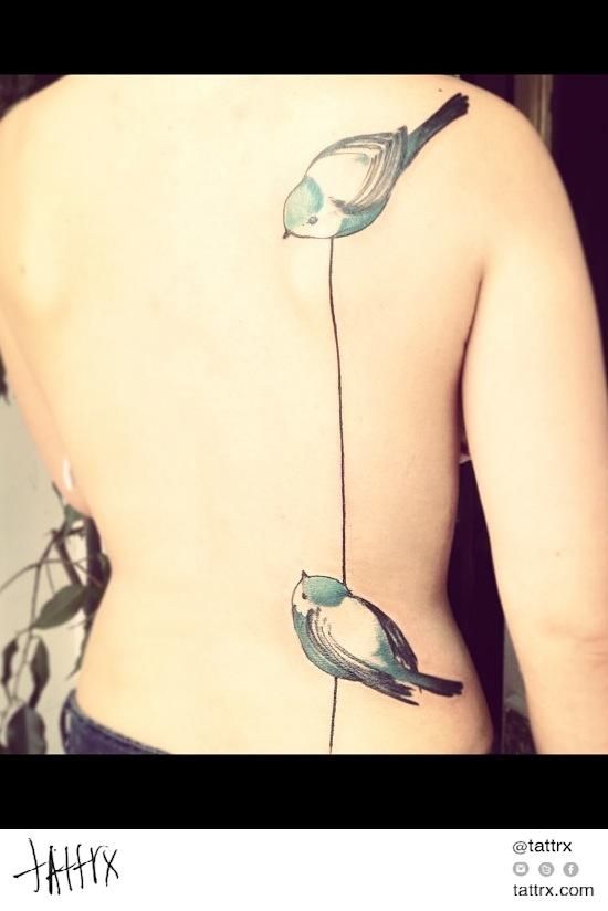 Two chickadees back tattoo