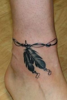 Two feathers ankle tattoo