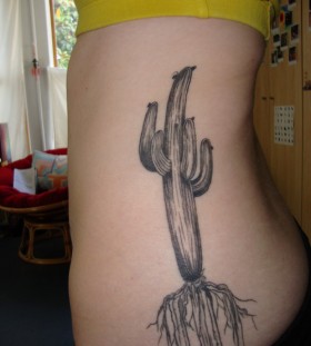 Uncoloured cactus side tattoo