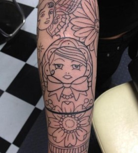 Uncoloured matryoshka arm tattoo