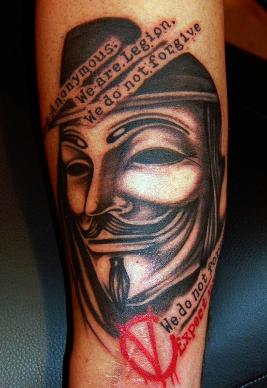 V arm tattoo with quote