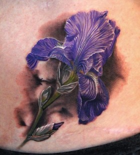 Violet flower tattoo by Phil Garcia