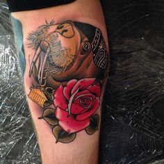 Walrus and rose tattoo by Dan Molloy