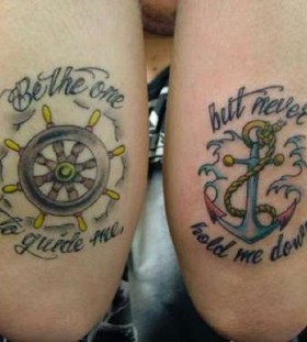 Wheel and quote tattoo
