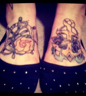 Wheel and rose foot tattoo