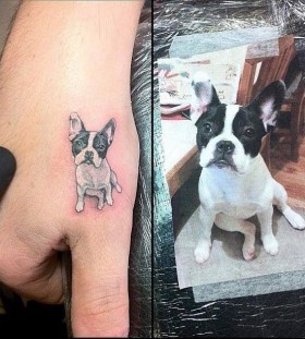 White and black dog's tattoo