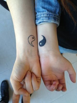 White and black family love tattoo