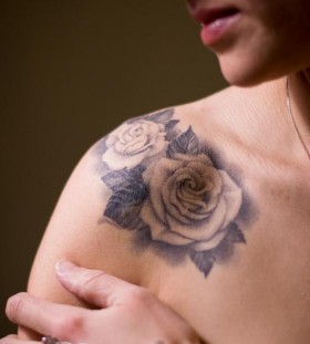 White rose collarbone tattoo