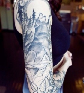 Wolf in forest and shoulder scary tattoo