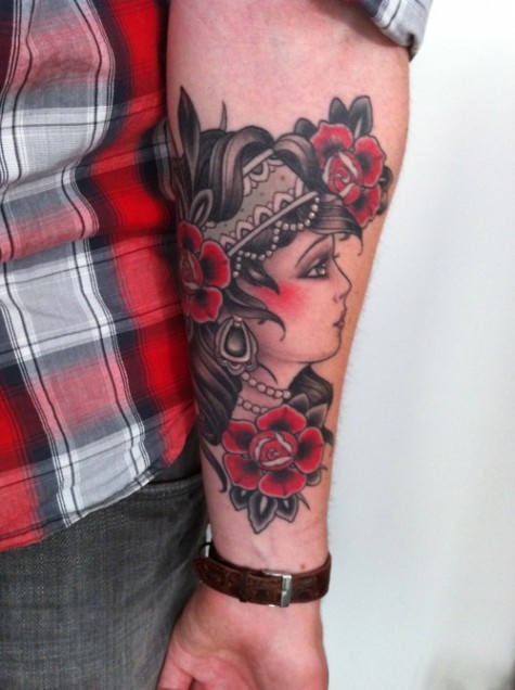 Woman and roses tattoo by W. T. Norbert