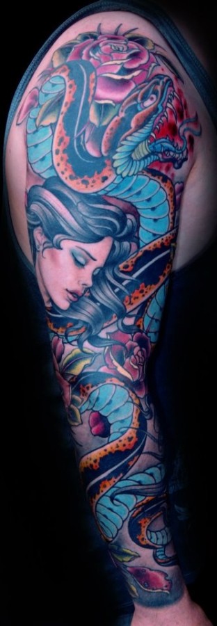 Woman and snake tattoo by W. T. Norbert