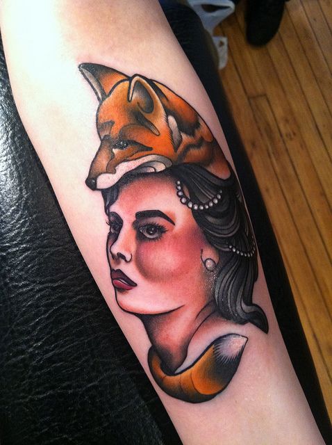 Woman with fox head tattoo by Amanda Leadman