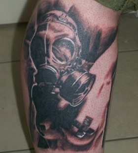 Woman with gas mask tattoo
