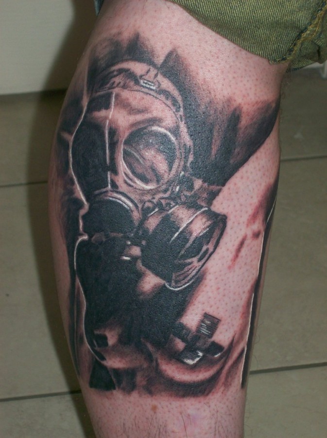 Woman with gas mask tattoo