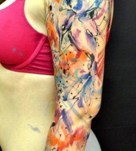 Women's arm's watercolor tattoo