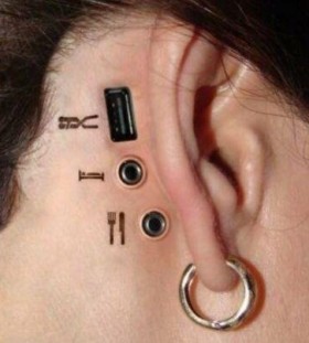 Women's ear scary tattoo