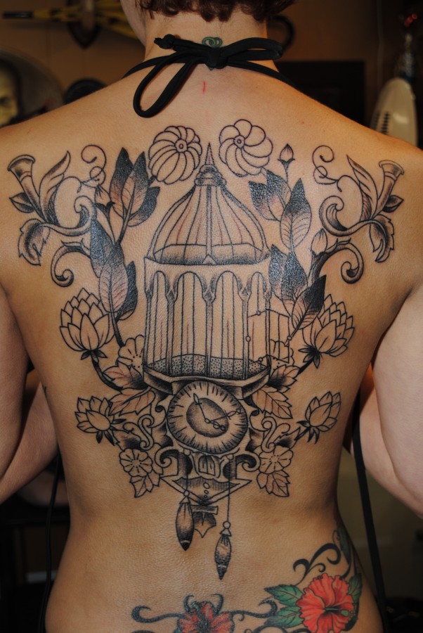 Wonderful birdcage back tattoo
