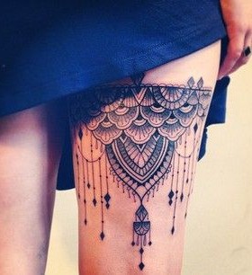 Wonderful chandelier leg tattoo