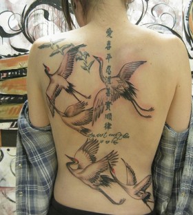 Wonderful crane back tattoo